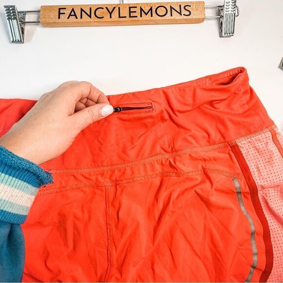 Athleta Bright Orange Running Shorts w/Back Zip Pocket & Reflective Trim Size M - Picture 7 of 9